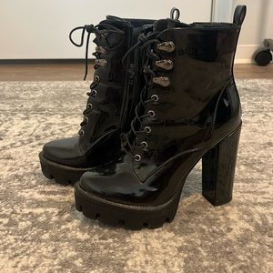 Black heeled combat boots